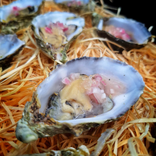 Oesters van de BBQ met Prosecco-Mignonette en Sjalot
